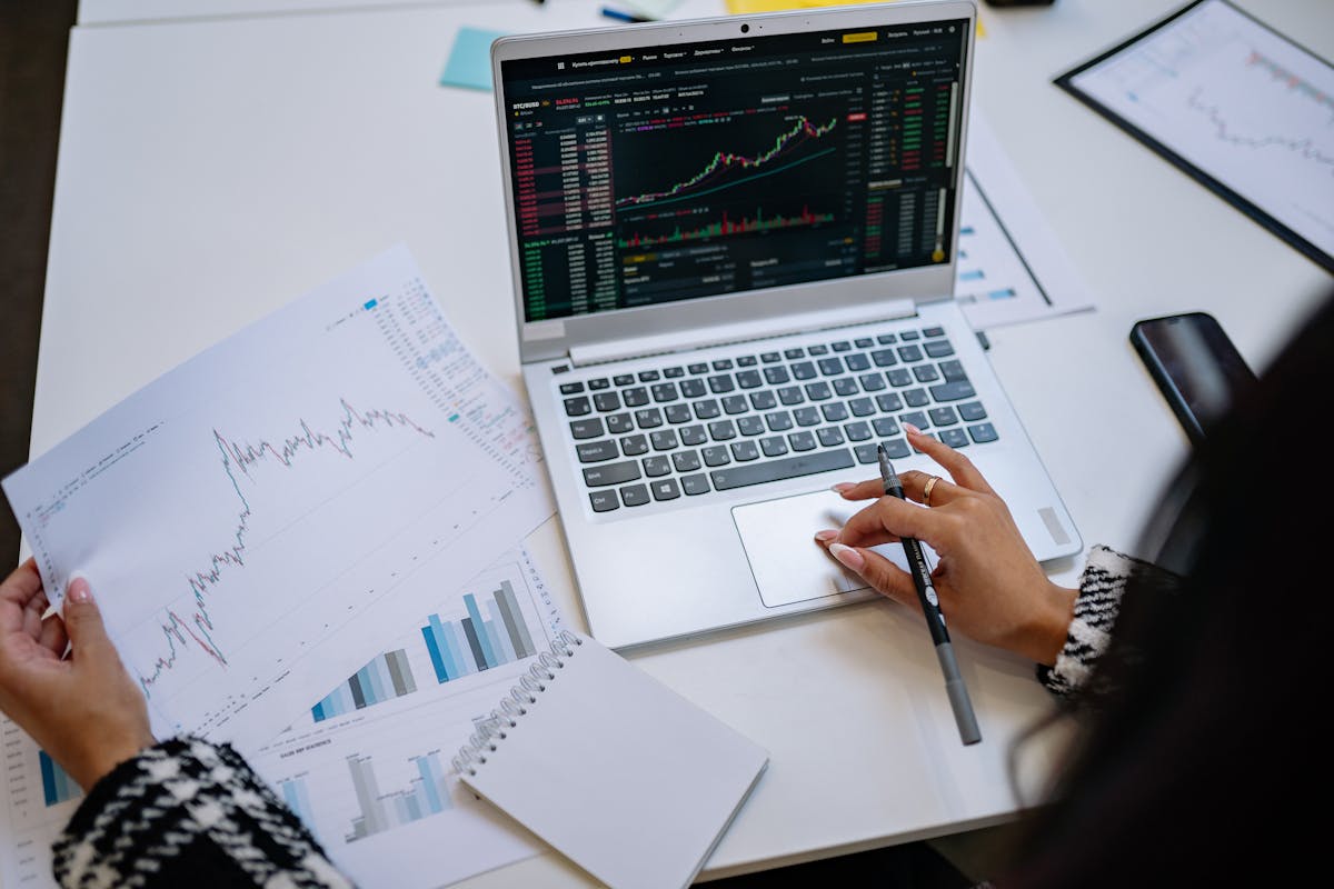 An investor reviewing market data during portfolio rebalancing